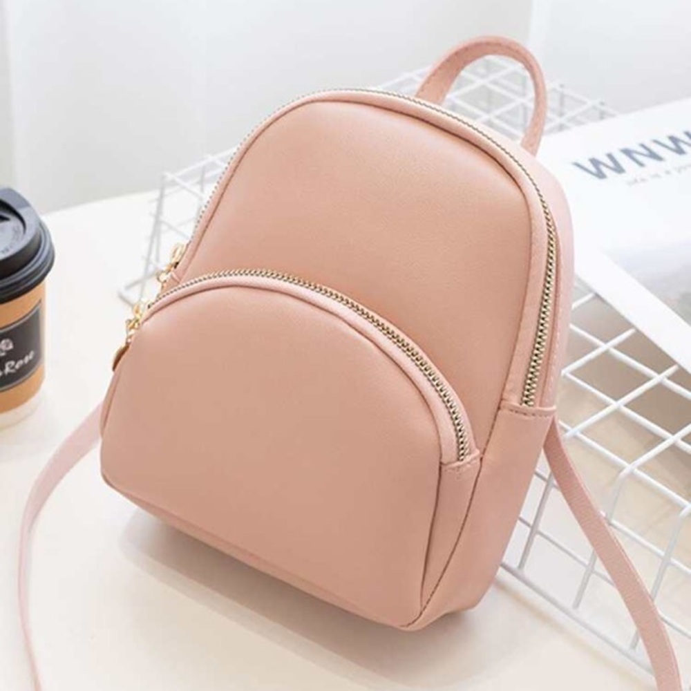 Pink faux leather backpack